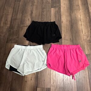 New Balance Shorts set size small. Black, teal (mint), and pink